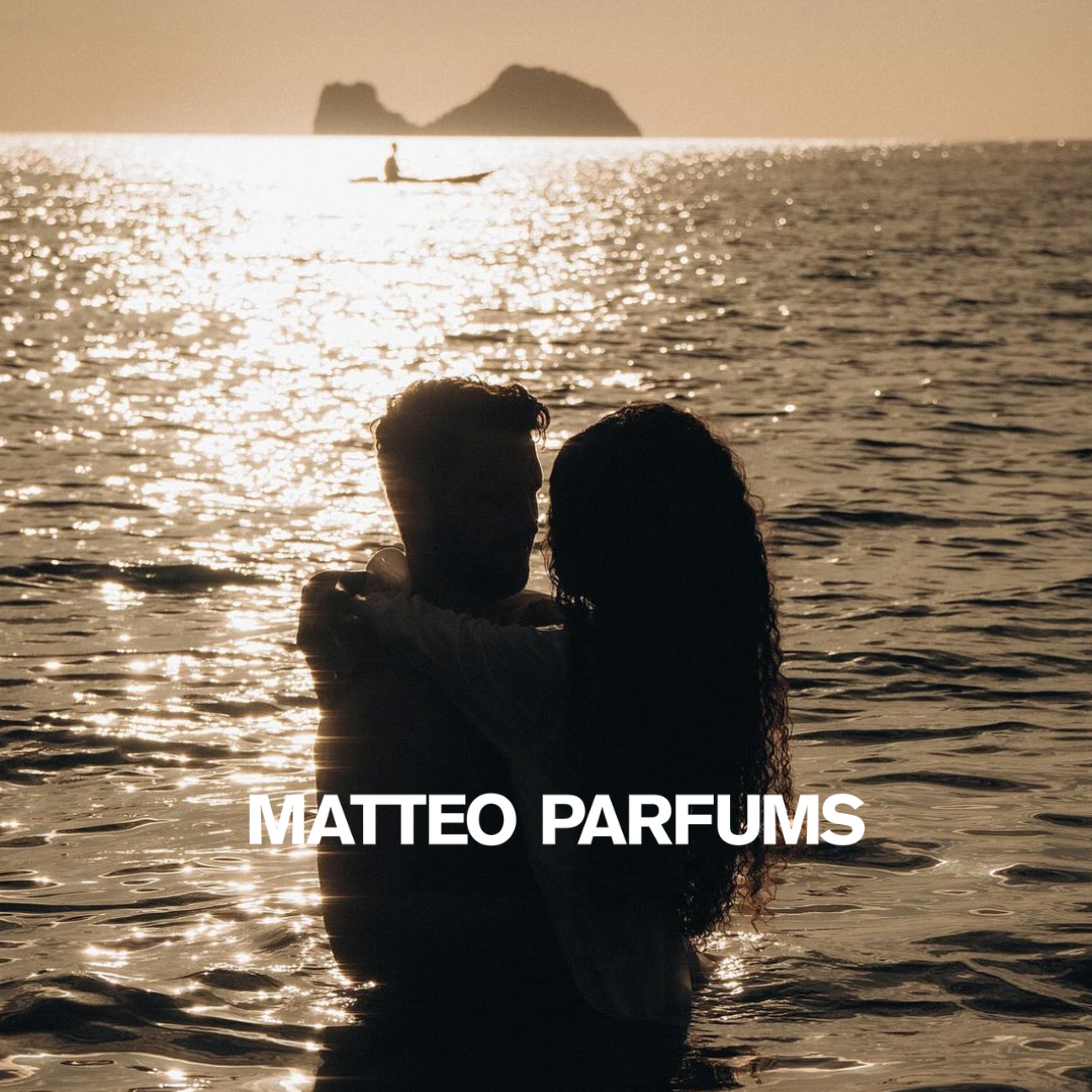 Silhouette of a couple embracing in the water on a beach with 'MATTEO PARFUMS' branding.