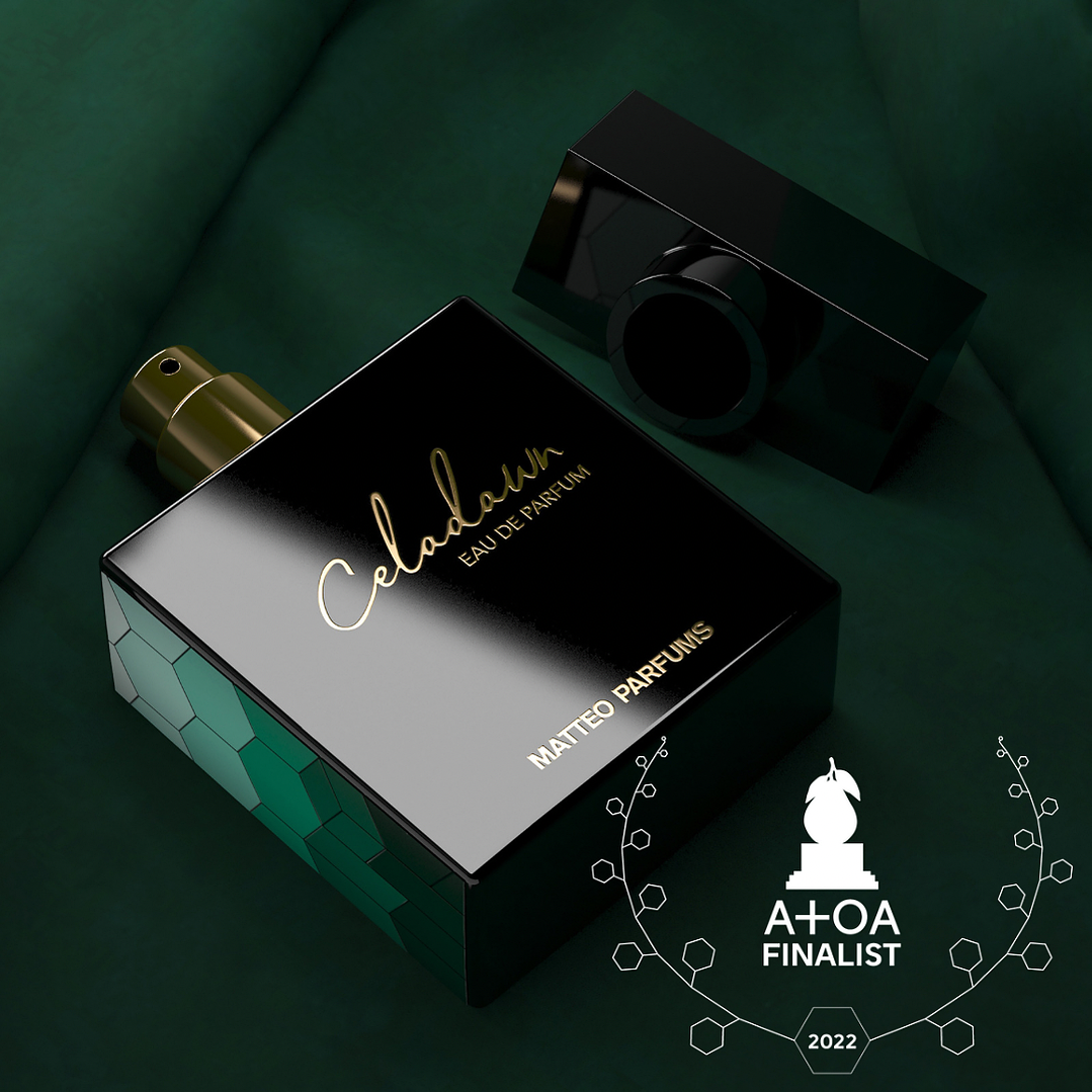 MATTEO PARFUMS Perfume bottle, with 'Celadawn' written in gold cursive, and lying on a dark green velvet background 