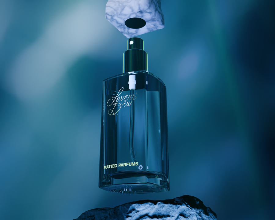 MATTEO PARFUMS fragrance Lovers' Dew floating underwater in a glowing blue and green background with a rock underneath the bottle